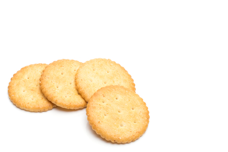 Crackers stacked isolated over white backgroundの写真素材