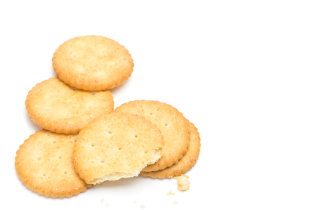 Crackers stacked isolated over white backgroundの写真素材