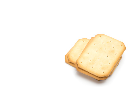 Crackers stacked isolated over white backgroundの写真素材