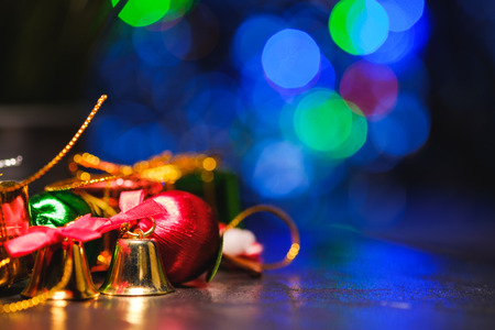 christmas ornaments with background of bokeh blurred lighting, low key pictureの写真素材