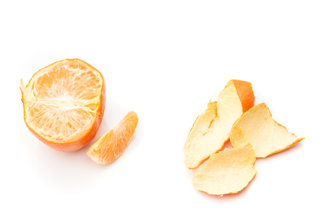 slice and half of orange with orange peel isolated on white backgroundの写真素材