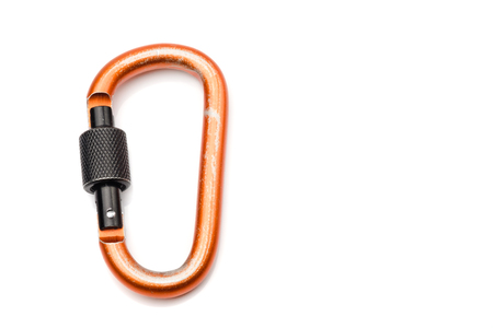 Carabiner D-Shaped in orange color with black locking isolated on white backgroundの写真素材