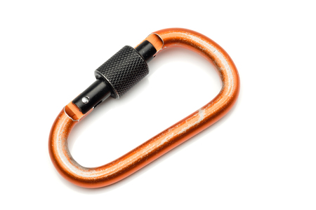 Carabiner D-Shaped in orange color with black locking isolated on white backgroundの写真素材