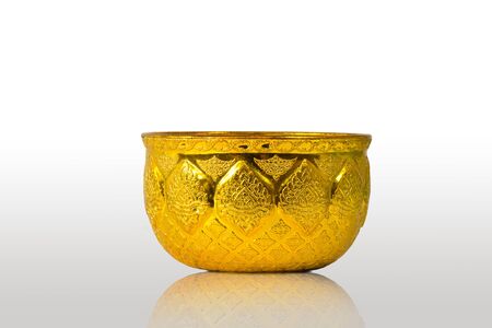 Old antique vintage gold, brass bowl, isolated on white backgroundの写真素材