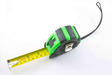 Single green and black tape measureの写真素材