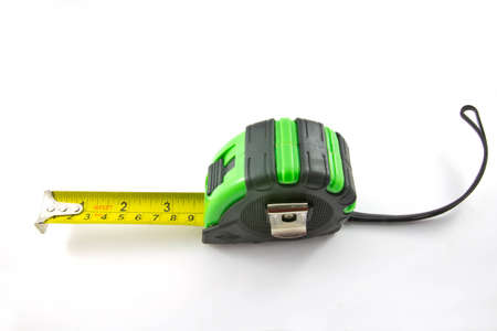 Single green and black tape measureの写真素材