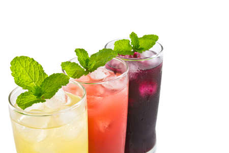 Three glass of apple,grape and strawberry juiceの写真素材