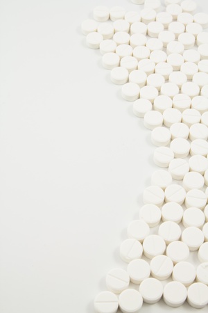 white tablets - medical backgroundの写真素材