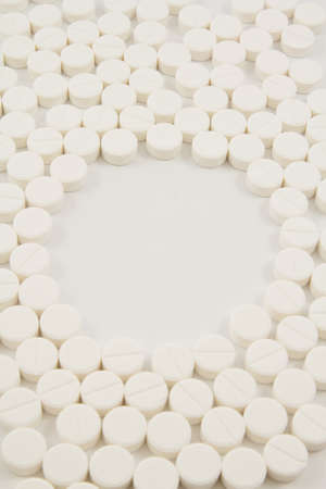white tablets - medical backgroundの写真素材