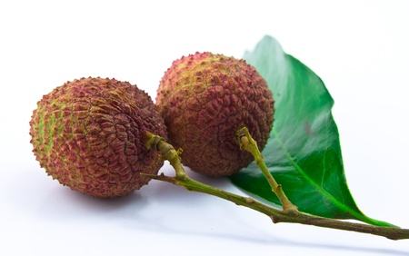 Fresh lychees isolated on whiteの写真素材