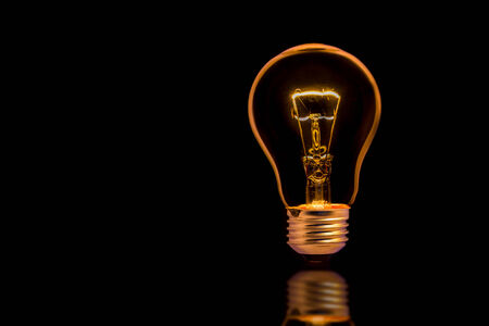 light bulb on black backgroundの写真素材
