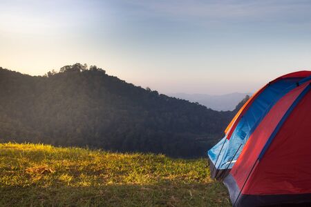 Camping in the mountain with morning lightの写真素材