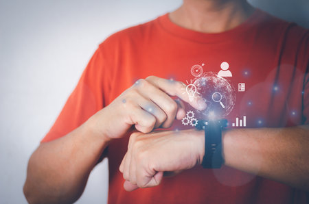 Man hand use smart wacth to access data and information on internet.の写真素材