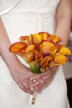 Kala bouquet in bride's handの写真素材