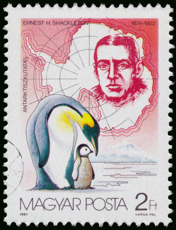 HUNGARY - CIRCA 1987: Stamp printed by Hungary, shows Ernest H Shackleton (1874-1922) discovering South Pole, circa 1987のeditorial素材