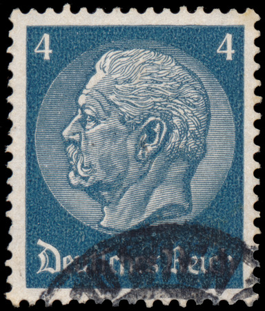 GERMANY - CIRCA 1934: A stamp printed in Germany shows portrait of Paul von Hindenburg - 2nd President of German Reich, circa 1934のeditorial素材