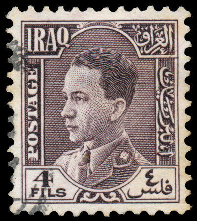 IRAQ - CIRCA 1934: Stamp printed in Iraq shows Ghazi bin Faisal, the King of the Hashemite Kingdom of Iraq, circa 1934のeditorial素材