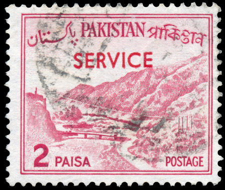 PAKISTAN - CIRCA 1961: A stamp printed in the Pakistan shows Khyber Pass, circa 1961の写真素材