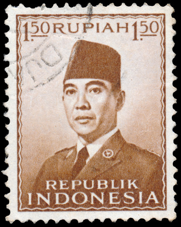 INDONESIA - CIRCA 1953: Stamp printed in the Indonesia shows the first president of Indonesia Sukarno, circa 1953のeditorial素材
