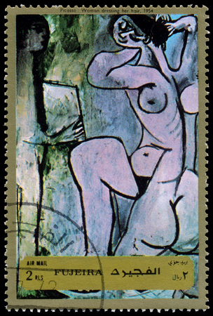 FUJEIRA - CIRCA 1972: a stamp printed in Fujeira shows painting by Picassoのeditorial素材