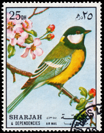 BUDAPEST, HUNGARY - 02 NOVEMBER 2015: a stamp printed in Sharjah shows great tit, circa 1972のeditorial素材