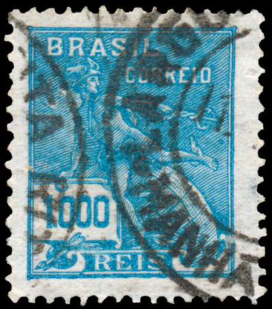 BUDAPEST, HUNGARY - 20 february 2016: a stamp printed in the Brazil shows Mercury and Globe, Symbol of Trade, circa 1928のeditorial素材