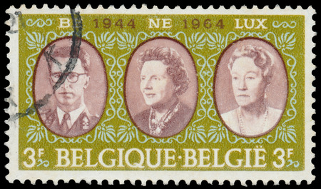 BUDAPEST, HUNGARY - 27 february 2016:  a stamp printed  in the Belgium shows Baudouin of Belgium, Queen Juliana, Grand Duchess Charlotte, circa 1964のeditorial素材
