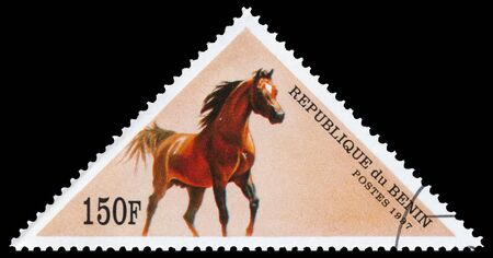 BUDAPEST, HUNGARY 11 February 2018 : A stamp printed in Benin showing horse, circa 1997のeditorial素材