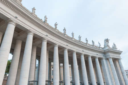 VATICAN CITY, VATICAN - OCTOBER 05, 2018: Colonnade in St Peter's Square in Vatican at St. Peter's Basilica, Rome, Italyのeditorial素材
