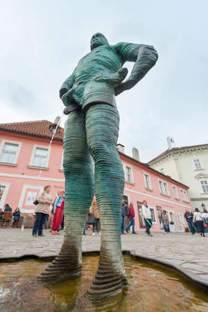 PRAGUE - 07. October 2017: Sculpture David Cerny, touristic landmark fountain with two adult pissing men with in water near the popular museum of the writer Franz Kafka, Prague, Czech Republicのeditorial素材