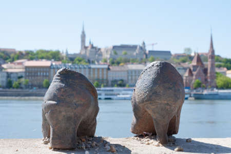 BUDAPEST, HUNGARY - APRIL 01, 2020: Iron shoes memorial to Jewish people executed WW2 in Budapest on the Danube Bankのeditorial素材