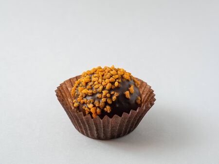 a small chocolate cake decorated with caramelの写真素材