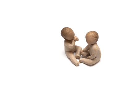 Figures of children made of clay, handの写真素材