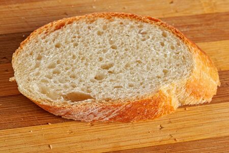 loaf of bread on a board grooved