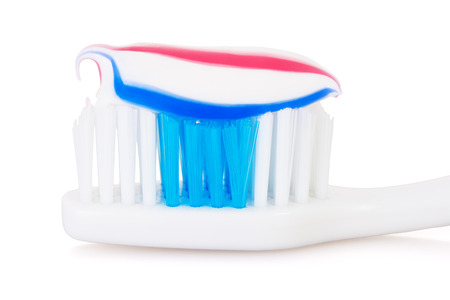 A toothbrush with toothpaste on isolatedの写真素材