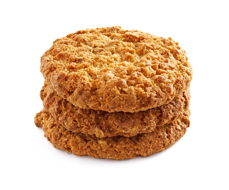 Several oatmeal cookies in a stack, on a white backgroundの写真素材
