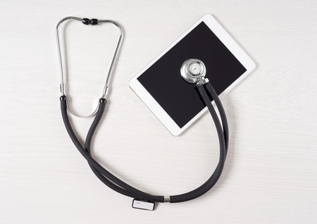 Tablet touch pad computer is in the doctor officeの写真素材