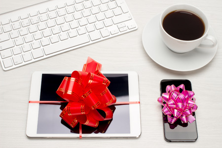 Gift for the holidays tablet with a bowの写真素材