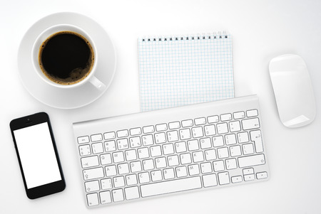 Top view with copy space, office desk table with computer and coffee cup, smartphoneの写真素材