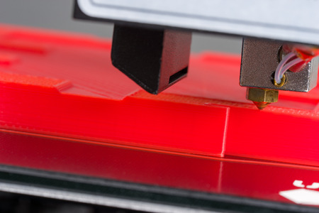 3D printer close-up during printingの写真素材