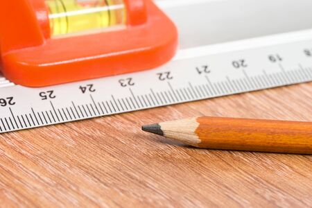 Ruler and pencil repair, laminate flooring installation