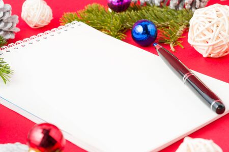 Christmas Notebook closeup on red background