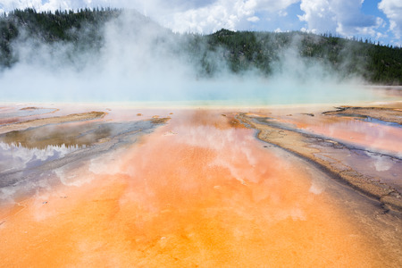 Amazing colourful bacteria and thermophiles at the Grand Prismatic Spring, Yellowstone National Park, Wyoming, USAの写真素材