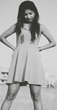 Portrait of a beautiful young woman looking downの写真素材