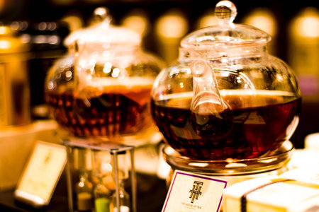 Black tea in glass kettleの写真素材