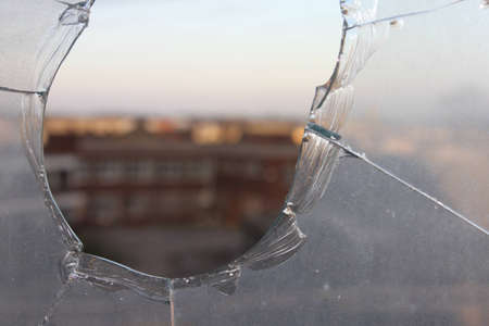 Broken window in focusの写真素材