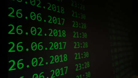 Computer monitor with hacker file checks. Green text on black monitor with contents of databases on the serverの写真素材