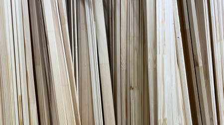 Workshop for the processing of wooden species, bars, boards, plywood lie in a warehouseの写真素材