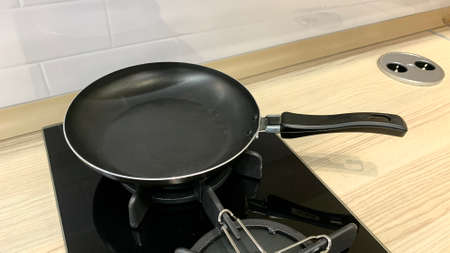 The new kitchen interior is ready to meet the welcome guests, table setting beginsの写真素材