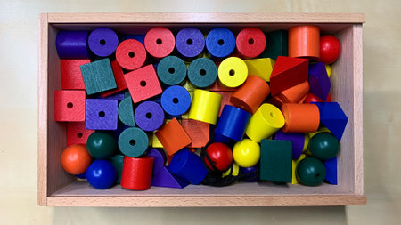 Set with wooden figures for children to explore shapes, colors and develop fine motor skillsの写真素材